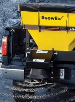 A combination of salt and sand applied to icy lots and roadways